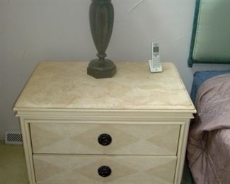 One of a pair two drawer night stands.