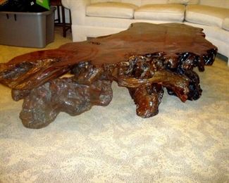 Fantastic burl wood cocktail table.