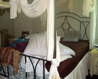 King metal canopy bed.