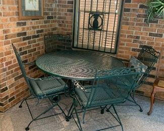 #2	Green Medcraft Wrought Iron Table w/4 bouncy Chairs   48 D x 29	 $175.00 	 call 256-603-4198 
