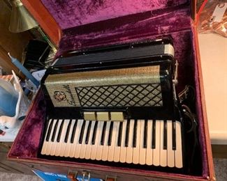 #73	SCANDALLI Accoridan in Case - Black/Gold	 $400.00 	 call 256-603-4198 
