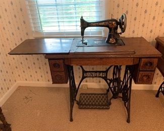 #77	Singer Tredle Cabinet w/machine in it	 $150.00 	 call 256-603-4198 
