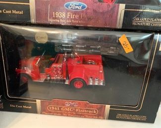 #146	KR	Die Cast 1941 GMC Firetruck 24K Gold plated coin Signature certificate 	 $25.00 	 call 256-603-4198 

