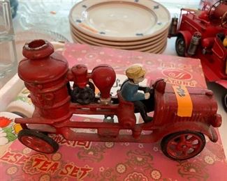 #147	KR	Iron red fire truck with yellow hat  man 	 $20.00 	 call 256-603-4198 
