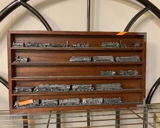 #74	Pewter train set of 24 in display cabinet on tracks 	 $30.00 	 call 256-603-4198 
