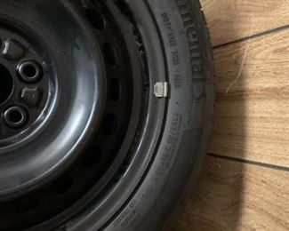 #94	garage	Continental P205/55R16 89VMS   Set of 4  - like new w/rim	 $200.00 
