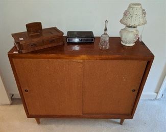 retro book case doors slide open