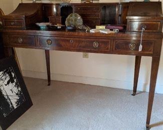 Inlaid desk, brass around back