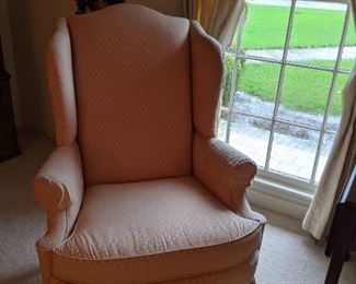 One of several wing chairs