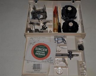 Singer Slant-O-Matic #401 sewing machine in cabinet, manual and many accessories