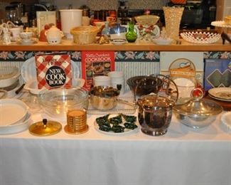 Baking dishes and supplies, cookbooks, Emeril stainless steel cookware, kitchen gadgets, Kitchenaid Ultra Power mixer new/newer, Keurig 2.0 K200 Plus, large marble cutting board, Magic Bullet cups and lids, marble mortar and pestle, marble rolling pin on stand, Oneida stainless steel tall pot with lid new, Osterizer blender, Pyrex sets of glass mixing bowls, Revere pots and pans vintage, set of clear mixing bowls marked France, Sharp Carousel microwave 1200w, Silit Germany vintage cookware set, Slice O Matic, small appliances, Sunbeam Mixmaster handheld, Sunbeam Osker, Turbo Chopper, various pots and pans, Fenton silver crest two-tier server,  Fenton hobnail pedestal cake plate, Corningware, English teacups and saucers, vases