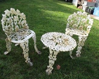 cast iron table & 2 chairs