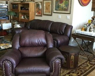 Genuine leather reclining couch and matching reclining chair. Excellent condition!!