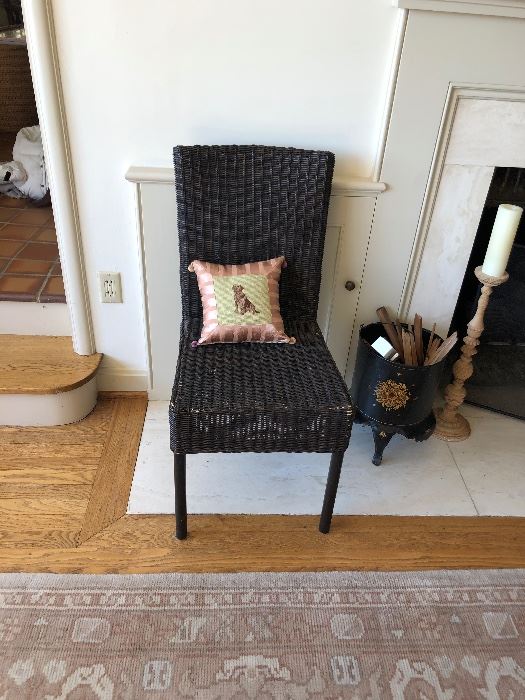 One of two caned chairs. (Pillow not for sale) $40 each.  Accessories shown are available onsite sale day only