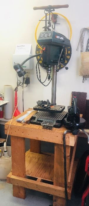Drill press with table