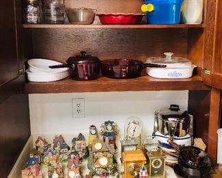 Assorted kitchen items- Pyrex/ corning-ware cookware and clock collection.