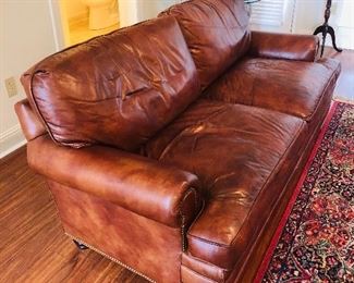 Hancock and Moore Overstuffed leather sofa with brass Nailhead trim.