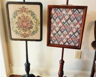 Antique black walnut fireplace screen- original petit- point beneath tapestry replacement.  Reproductive fireplace screen with needlework.