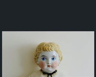 Second Picture of 22-1/2” Blonde China girl doll.