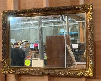 Carved, Gilted wood framed beveled glass mirror. $150