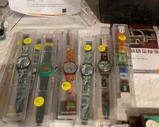 1993 limited edition swatch watches all new in cases.  $40 each.  9 available. Also 9 boxed sets Swatch Anniversary of the Swiss Federation Series  Selling for $275 each our price $135 Each Set all NEW in boxes