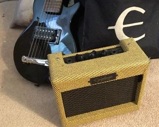 The Epiphone is a portable amplifier and runs off a 9 volt battery.