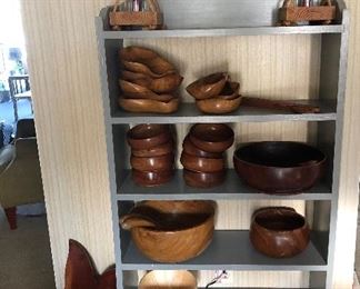 Bookcase.  Carved wooden bowls