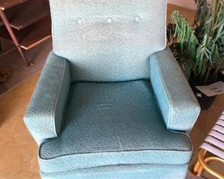 This is a MCM chair upholstered in original boucle fabric, a little faded but in good shape.