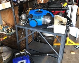 Pressure washer, wet/dry vac, and small vacuum.
