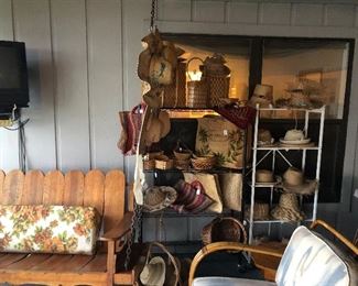 Hats woven from palm fronds were collected by the owners from countries all over the world.  Hats, bags, baskets.