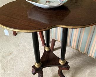 One of several tripod antique  tables