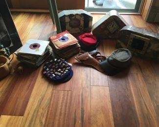 Art Deco clocks, vintage toy gun, painted table, hats, 45’s