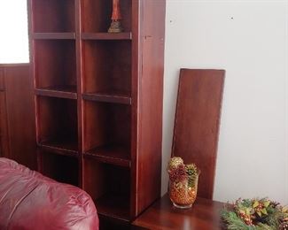 5 piece flat screen tv armoire.  two bookshelves, center table, overhead piece and one shelf--that is shown leaning on the wall.