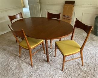 1. Paul McCobb Dining Table by Calvin with 4 chairs in good condition.  2 leaves, included  $1100 (one chair has a spot on the back of upholstery)