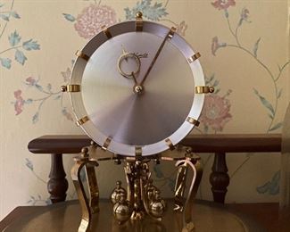 12. Brass winding  clock.  Works intermittently.  Not cleaned.  $95