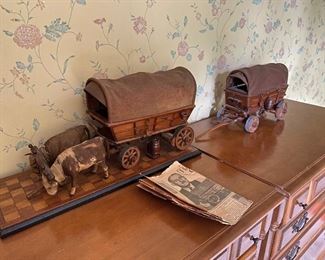 14. Handmade covered wagons and real hide steer.  Made by Famous artist $100