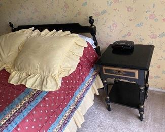 19. Full size antique bed with nice subtle head and foorboard painted with gold relief and black, comes with small side table and bedding $125