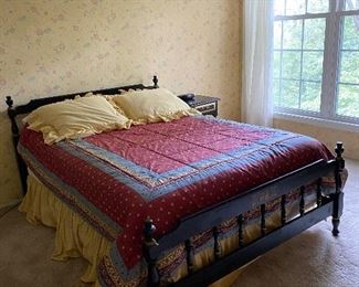 19. Full size antique bed with nice subtle head and foorboard painted with gold relief and black, comes with small side table and bedding $125