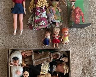 25. Set of dolls, mostly dolls of the world and a cute cowgirl $25