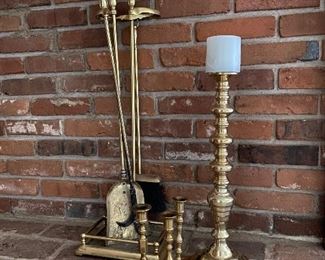 44. Brass candlesticks adn fireplace tools $25