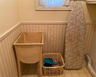 67. Metal washtub and ironing board, and rug etc $40