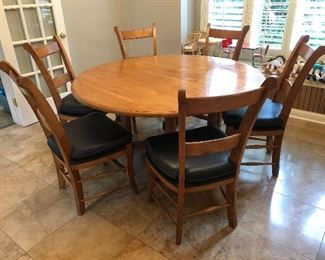 Round wood table and 6 chairs......