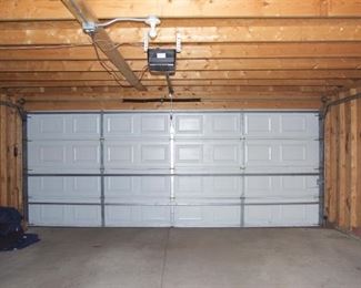 $140 -- Two-car garage doors. Has some dents on other side.