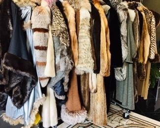 Collection of Fur and Faux Fur coats sizes range from 8 to large. 