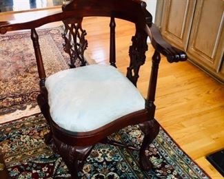 one of a pair of corner chairs