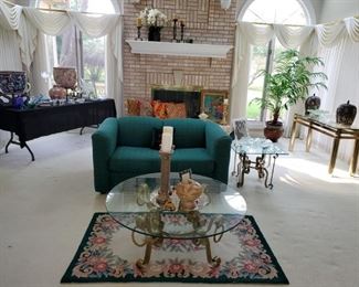 Sleeper loveseat, contemporary glass coffee table, matching end table,  area rug, large Asian planter/pots