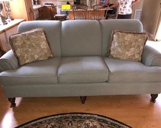 Light Green upholstered Sofa, no damage, barely used