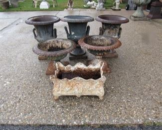 Lot Of Cast Iron Urns And a Planter