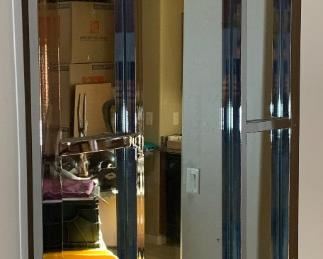 MCM Vintage Chrome Frame Elongated Octagon Mirror	56in H x36in W x2in D	HxWxD