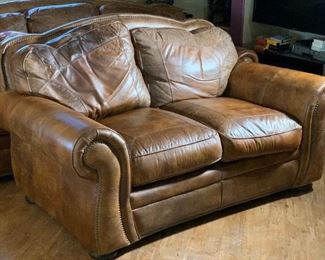 Rustic Tooled Leather Nailhead Sofa loveseat	39x67x42in	HxWxD